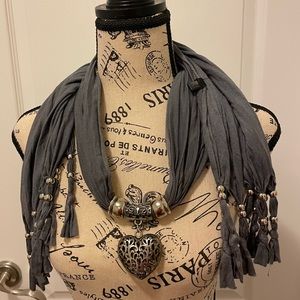Grey cotton scarf with central celtic silver-ish heart ornament beads fringe